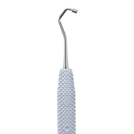 Side One of the PDT Backaction Plugger 11/12 Instrument (Serrated)