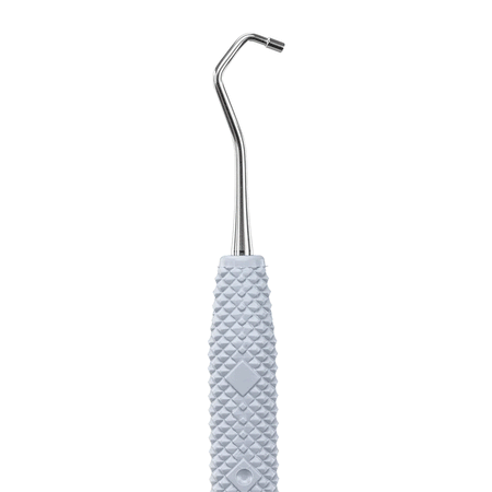 Side Two of the PDT Backaction Plugger 11/12 Instrument (Serrated)
